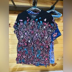 Butter soft scrub top black with different flowers